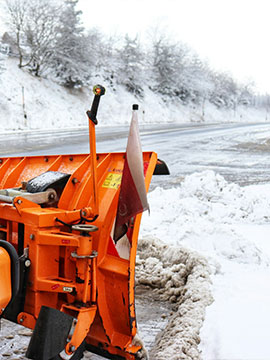 plow in snow clearing path